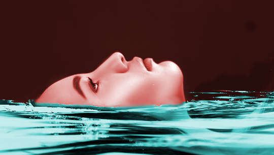 How To Develop Courage and Move Out of Your Comfort Zone face of woman floating in water