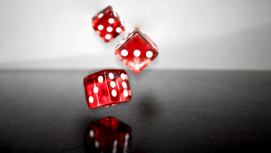 The Gift of Uncertainty: Making Friends with Maybe red dices in mid air