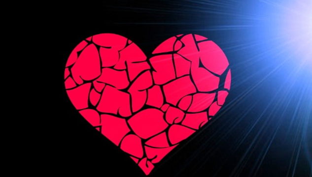 drawing of a "cracked" heart with a bright white light on the side. Image by Mariana Vartaci from Pixabay